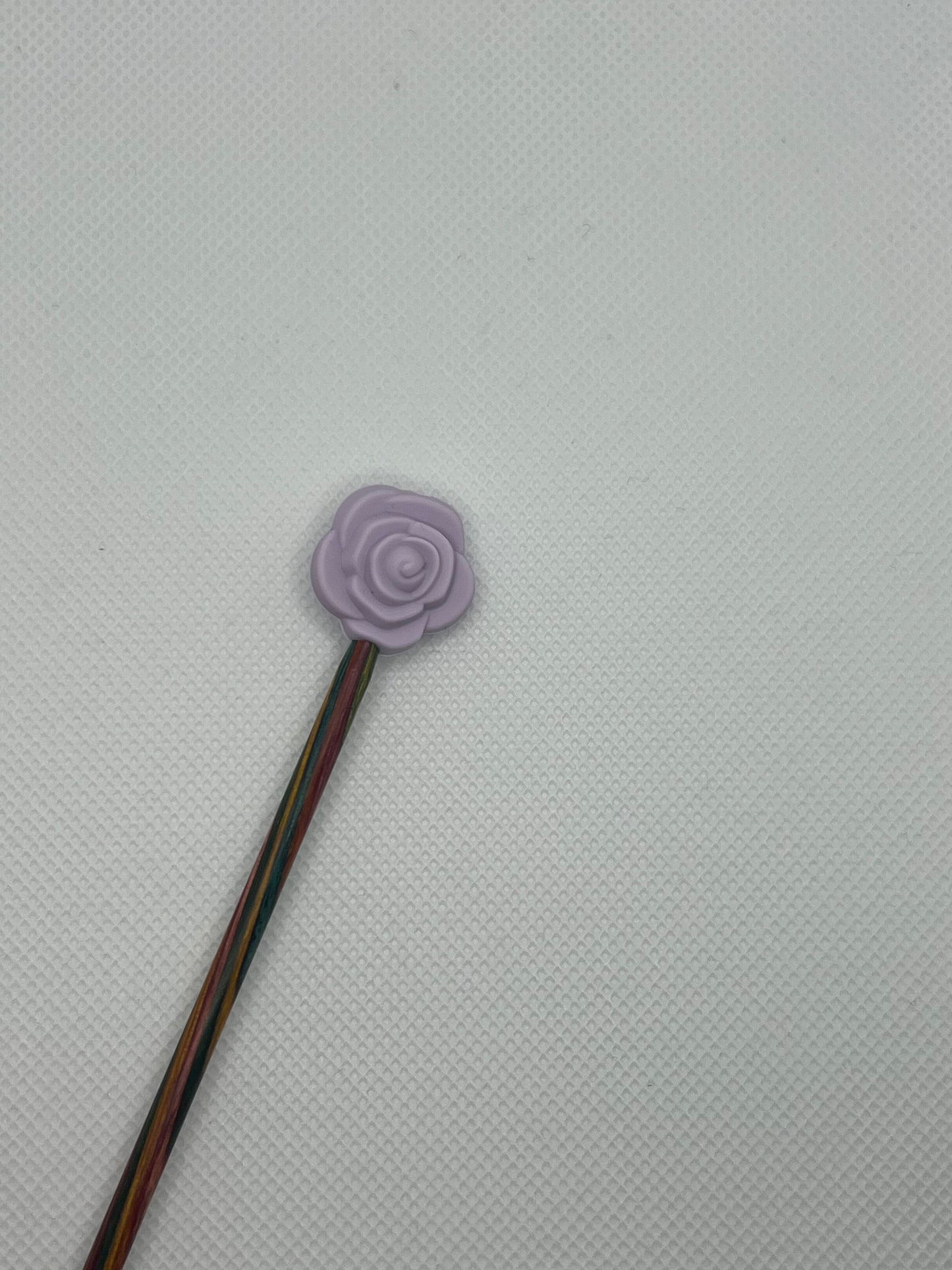 Pinnestopper, Rose