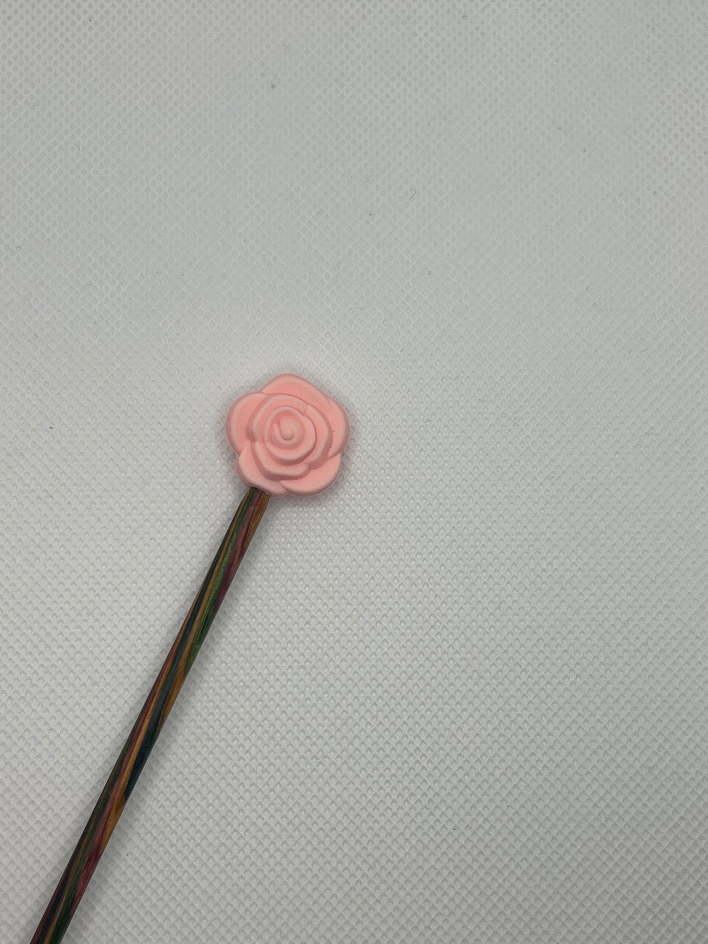 Pinnestopper, Rose