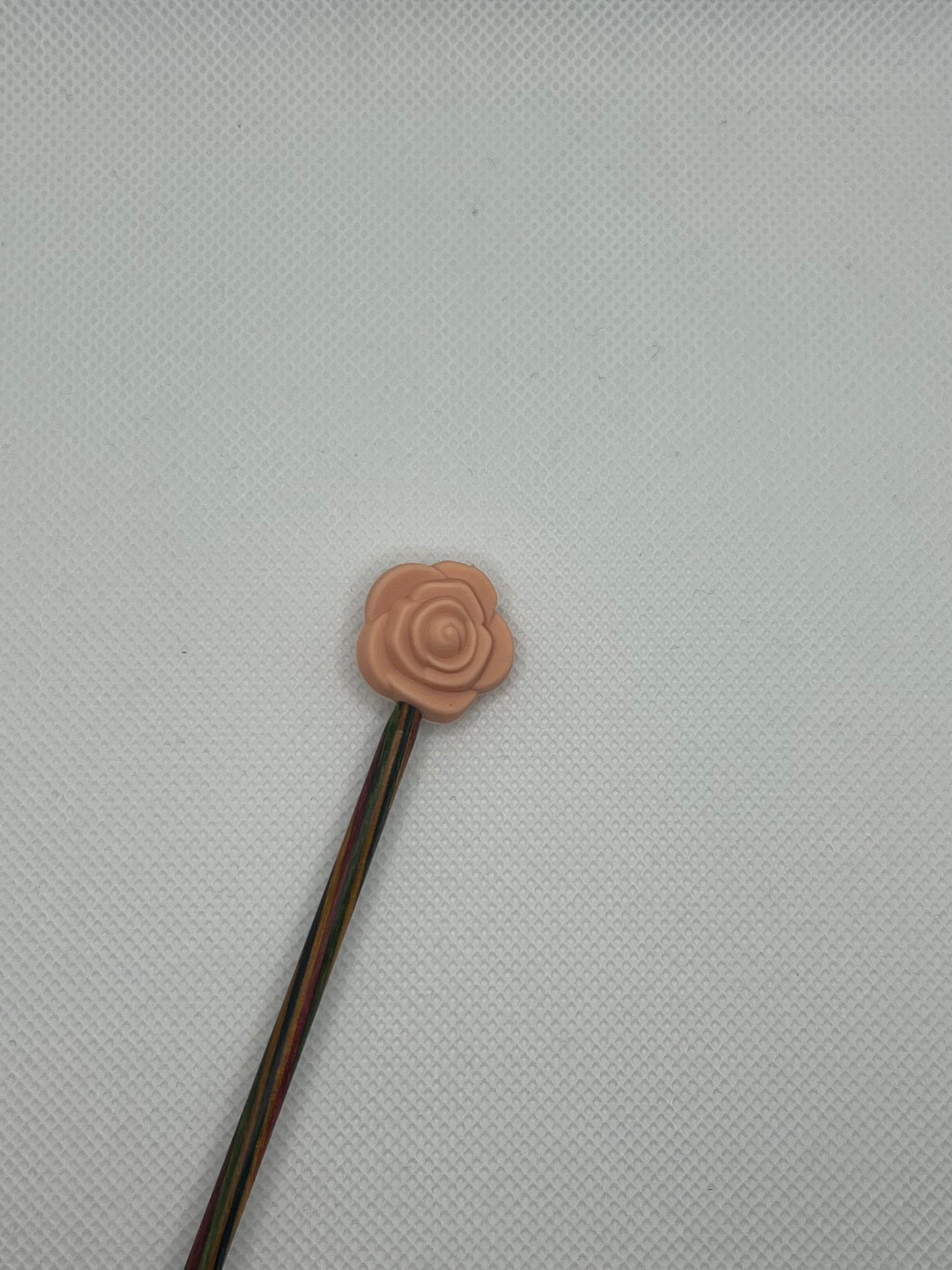 Pinnestopper, Rose