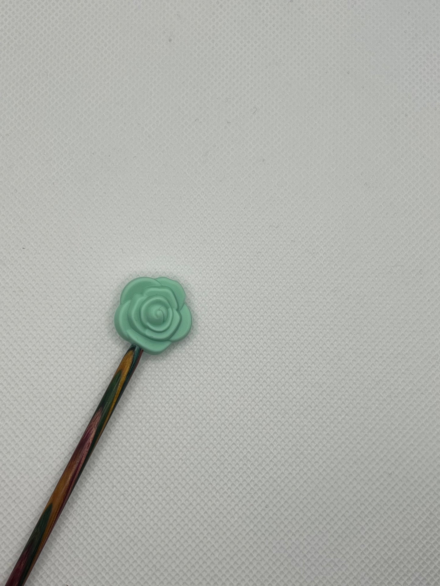 Pinnestopper, Rose